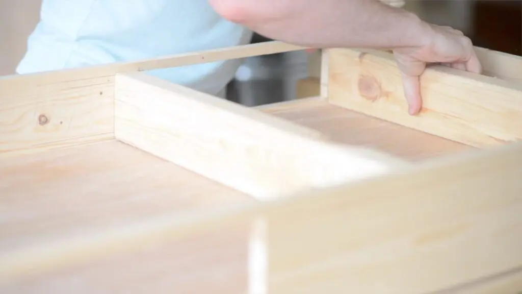 attaching 2x4 braces to the table top