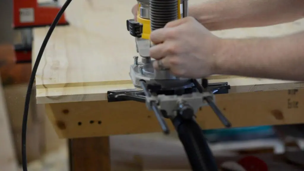 cutting breadboard end with the router