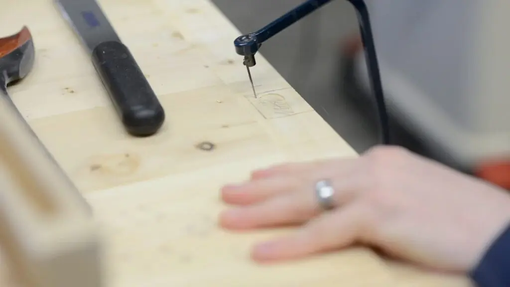 cutting breadboard end with the coping saw