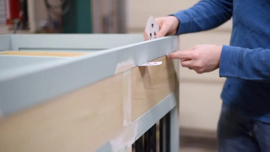 using playing cards to position and attach the drawer fronts